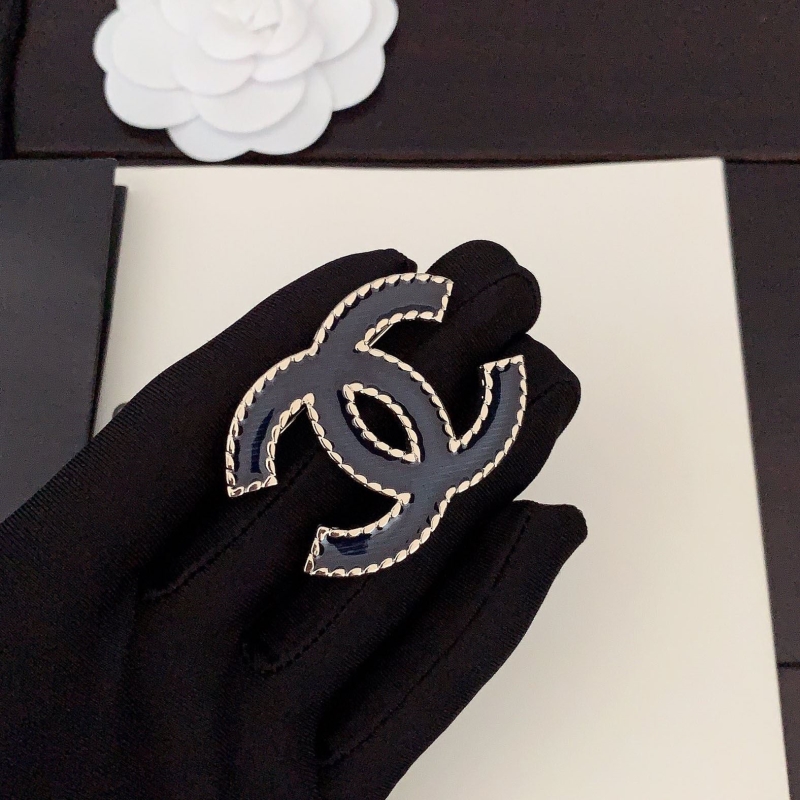 Ch*el brooches